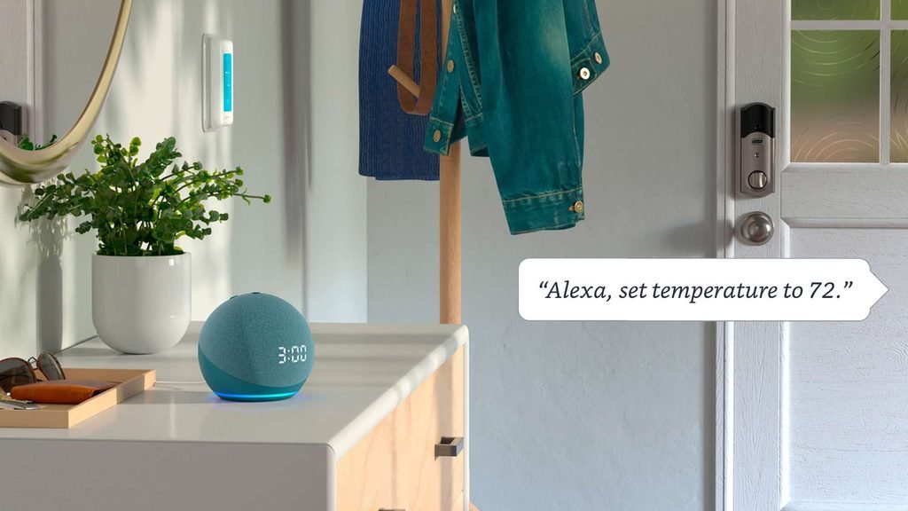 Amazon Echo Dot 5th Gen with clock showing time on table.
